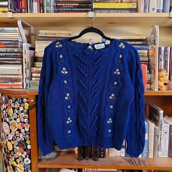 Shenanigans Sweaters - Vintage sweater with puffed shoulders and floral details.